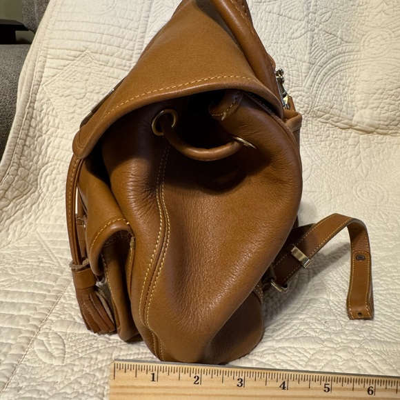 Dooney & Bourke tan pebbled leather drawstring backpack - Picture 4 of 11